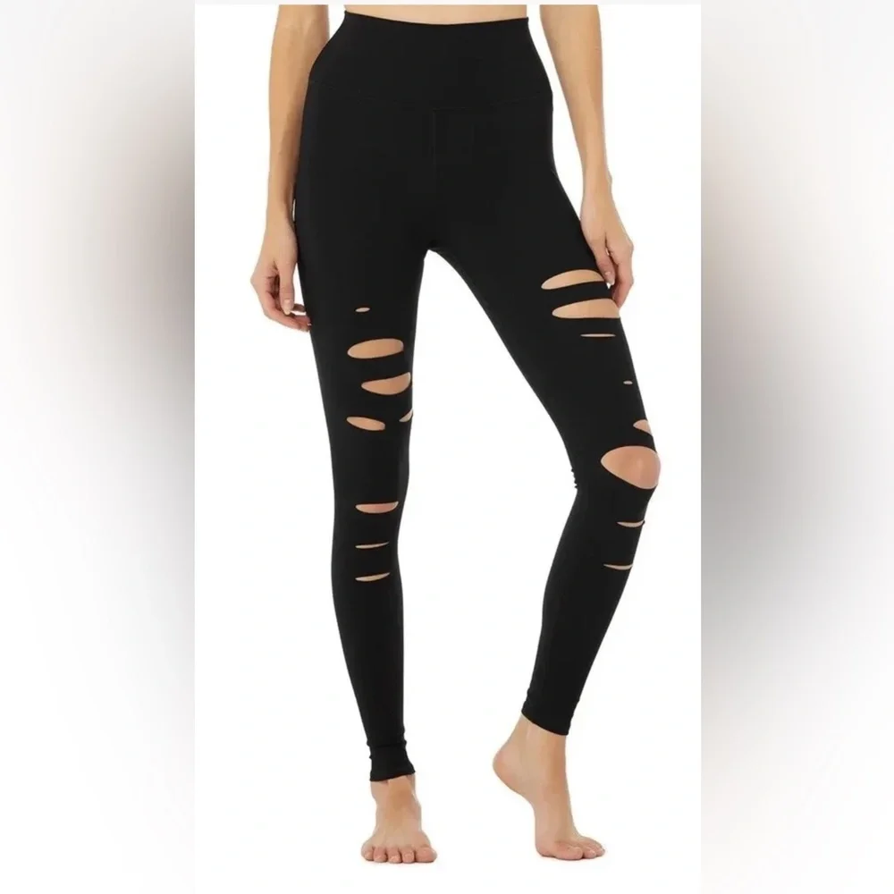 ALO Yoga black ripped high waist warrior leggings.